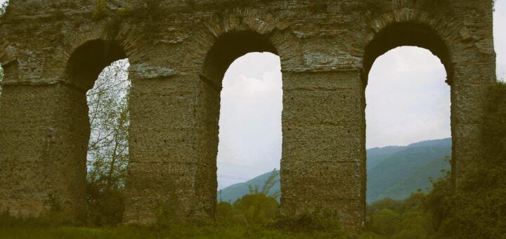 B&W photo of stone archways